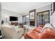 Living area featuring a fireplace and access to a private patio at 7300 Porcher Dr. # 8, Myrtle Beach, SC 29572