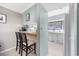 Kitchen features light teal cabinets and breakfast bar at 7300 Porcher Dr. # 8, Myrtle Beach, SC 29572