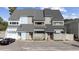 Two-story townhome with light blue and gray siding at 7300 Porcher Dr. # 8, Myrtle Beach, SC 29572
