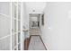 Bright entryway with tile flooring, glass door, and staircase leading upstairs at 7300 Porcher Dr. # 8, Myrtle Beach, SC 29572