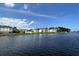 Waterfront view of several condo buildings with lush green landscaping at 1525 Lantern Rest Dr. # 301, Myrtle Beach, SC 29579