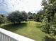 View of a community lawn with trees and walking path at 1525 Lantern Rest Dr. # 301, Myrtle Beach, SC 29579
