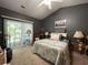 Bedroom with double bed, carpet, and access to balcony at 1525 Lantern Rest Dr. # 301, Myrtle Beach, SC 29579