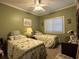 Bedroom with two twin beds and green walls at 1525 Lantern Rest Dr. # 301, Myrtle Beach, SC 29579