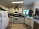 Kitchen with white cabinets, appliances, and tile floor at 1525 Lantern Rest Dr. # 301, Myrtle Beach, SC 29579