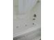 Bathroom with shower/tub combo and white tiled walls at 4105 S Ocean Blvd. S # 102, North Myrtle Beach, SC 29582