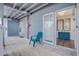 Private deck with teal chair, offering peaceful outdoor space at 4105 S Ocean Blvd. S # 102, North Myrtle Beach, SC 29582