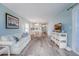 Open concept living area with hardwood floors and neutral colors at 4105 S Ocean Blvd. S # 102, North Myrtle Beach, SC 29582
