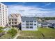 Aerial photograph of oceanfront homes and a pool in a coastal setting at 4105 S Ocean Blvd. S # 102, North Myrtle Beach, SC 29582