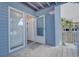 Exterior view of building entrance with private deck access at 4105 S Ocean Blvd. S # 102, North Myrtle Beach, SC 29582