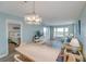 Open living space with hardwood floors, light walls, and ocean views at 4105 S Ocean Blvd. S # 102, North Myrtle Beach, SC 29582