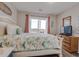 Main bedroom with ocean view, king bed, and private balcony at 4105 S Ocean Blvd. S # 102, North Myrtle Beach, SC 29582