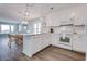 Open concept kitchen with white cabinets and island at 4105 S Ocean Blvd. S # 102, North Myrtle Beach, SC 29582