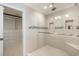 Walk-in shower with glass enclosure and built-in shelving at 204 5Th Ave. N, North Myrtle Beach, SC 29582