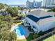 Aerial view of a house with a pool in the backyard, near the beach at 204 5Th Ave. N, North Myrtle Beach, SC 29582