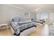 Bright bedroom with two twin beds, light wood floors, and a ceiling fan at 204 5Th Ave. N, North Myrtle Beach, SC 29582