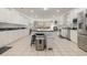 Spacious kitchen boasts granite countertops, stainless steel appliances, and ample cabinet storage at 204 5Th Ave. N, North Myrtle Beach, SC 29582