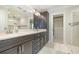 Double vanity bathroom with a large walk-in shower at 204 5Th Ave. N, North Myrtle Beach, SC 29582