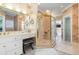 Bathroom with a walk-in shower, double vanity, and lots of natural light at 204 5Th Ave. N, North Myrtle Beach, SC 29582