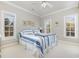 Guest bedroom with a comfortable bed and plenty of natural light at 204 5Th Ave. N, North Myrtle Beach, SC 29582
