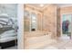 Elegant bathroom with a large soaking tub, walk-in shower, and double vanity at 204 5Th Ave. N, North Myrtle Beach, SC 29582