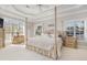 Large main bedroom with a four-poster bed and ample closet space at 204 5Th Ave. N, North Myrtle Beach, SC 29582