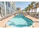 Outdoor pool with bridge and lounge chairs at 6804 N North Ocean Blvd. # 933, Myrtle Beach, SC 29572