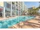 Resort-style outdoor pool with lounge chairs at 6804 N North Ocean Blvd. # 933, Myrtle Beach, SC 29572