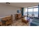 Living room offers ocean view and comfortable seating at 6804 N North Ocean Blvd. # 933, Myrtle Beach, SC 29572