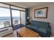 Living area with ocean view and balcony access at 6804 N North Ocean Blvd. # 933, Myrtle Beach, SC 29572