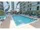 Refreshing pool with surrounding lounge chairs at 6804 N North Ocean Blvd. # 933, Myrtle Beach, SC 29572