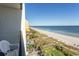 Expansive ocean view from balcony, showcasing beach and coastline at 6804 N North Ocean Blvd. # 933, Myrtle Beach, SC 29572