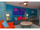 Coastal-themed living room featuring a comfy sofa and accent chairs at 5300 North Ocean Blvd. # 1405, Myrtle Beach, SC 29577