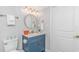Clean bathroom with blue vanity, marble countertop, and updated fixtures at 5300 North Ocean Blvd. # 1405, Myrtle Beach, SC 29577