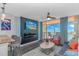 Living room boasts an ocean view, fireplace, and stylish decor at 5300 North Ocean Blvd. # 1405, Myrtle Beach, SC 29577