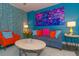 Living area with blue walls, comfy seating, and a coastal vibe at 5300 North Ocean Blvd. # 1405, Myrtle Beach, SC 29577