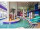 Indoor lazy river and pool with tropical landscaping at 5300 North Ocean Blvd. # 1405, Myrtle Beach, SC 29577