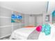 Spacious bedroom with large TV, comfortable king-size bed, and ocean view at 5300 North Ocean Blvd. # 1405, Myrtle Beach, SC 29577