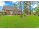 Large backyard with lush lawn, mature trees and privacy at 676 Oxbow Dr., Myrtle Beach, SC 29579