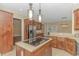 Kitchen features island, stainless steel appliances, and ample cabinets at 676 Oxbow Dr., Myrtle Beach, SC 29579