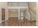 Two-story foyer with hardwood floors and elegant staircase at 676 Oxbow Dr., Myrtle Beach, SC 29579