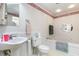 Clean bathroom with a bathtub, toilet and sink at 336 Piedmont Ave., Myrtle Beach, SC 29577