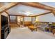 Cozy Gathering room with wood-paneled walls and a comfortable couch at 336 Piedmont Ave., Myrtle Beach, SC 29577