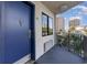 Private balcony with blue door and ocean view at 200 76Th Ave. N # 411, Myrtle Beach, SC 29572