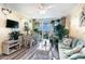 Living area with ocean view, seating area, and dining area at 200 76Th Ave. N # 411, Myrtle Beach, SC 29572