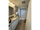 Clean bathroom with granite vanity and tub/shower combo at 601 Retreat Beach Circle # 524, Pawleys Island, SC 29585