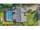 Aerial view showing house, pool, and surrounding landscape at 504 13Th Ave. S, North Myrtle Beach, SC 29582