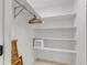 Shelved closet with hanging rod and laundry hamper at 504 13Th Ave. S, North Myrtle Beach, SC 29582