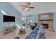 Bright living room with vaulted ceilings, fireplace, and comfy seating at 504 13Th Ave. S, North Myrtle Beach, SC 29582