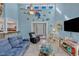 Spacious living area with large windows and coastal decor at 504 13Th Ave. S, North Myrtle Beach, SC 29582